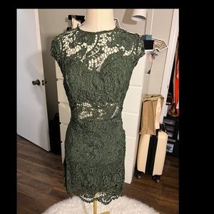 Green lacy bebe dress worn once.